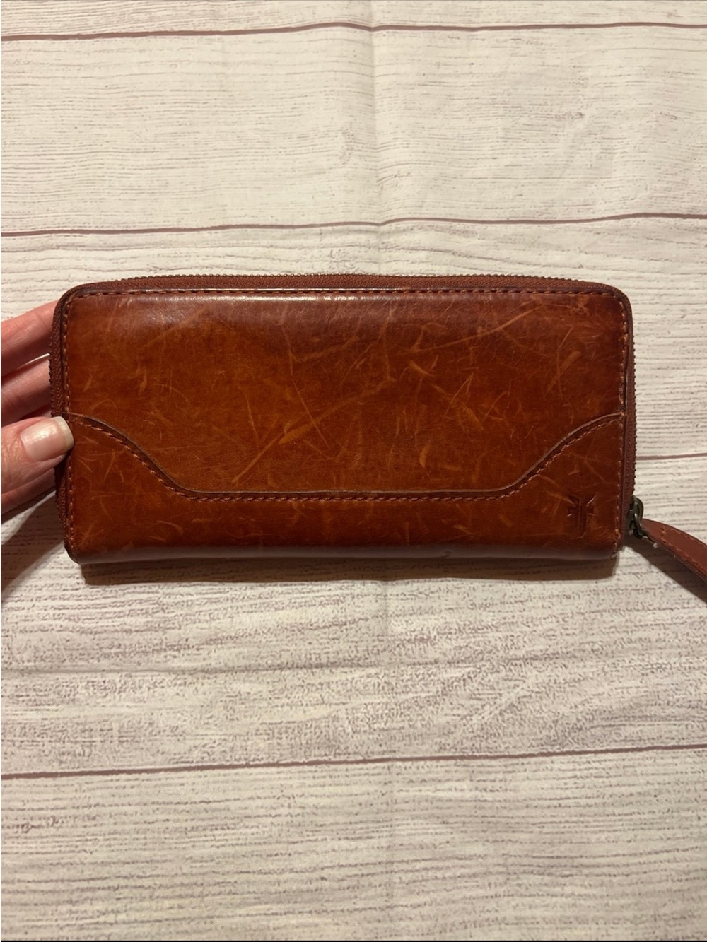 Frye Melissa Zip Wallet made of antique pull-up leather
